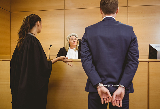 A Criminal Lawyer in Peoria IL presenting their client's case in front of a judge
