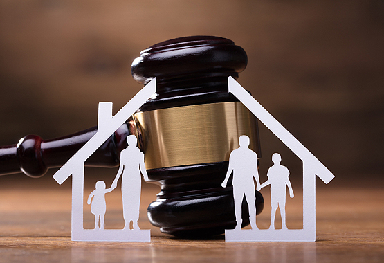 gavel splitting up a paper home and family cutout