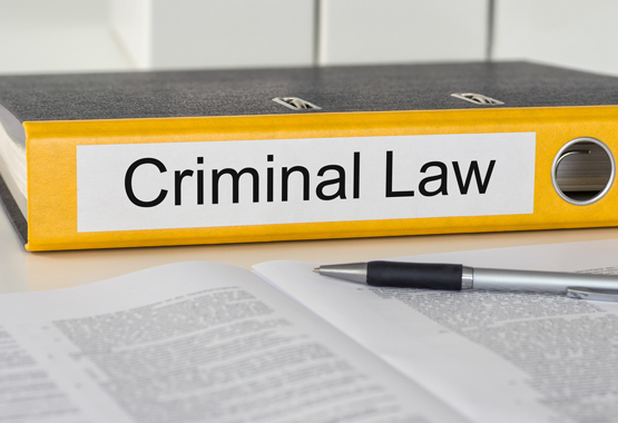 black and yellow book about criminal law