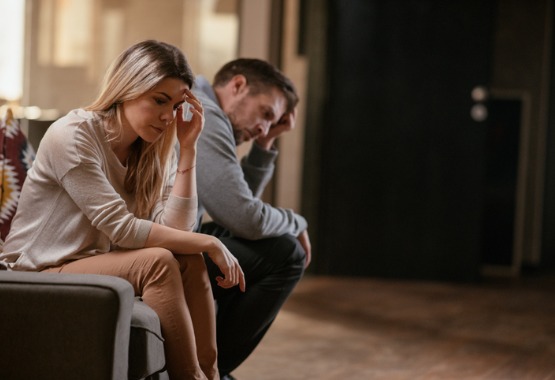 An unhappy couple needing help from a Peoria IL Divorce Attorney