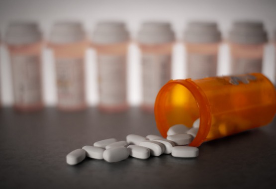Prescription Drugs pouring out of bottle in Peoria IL