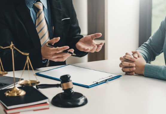 A lawyer and client discuss a case regarding Juvenile Law in Dunlap IL