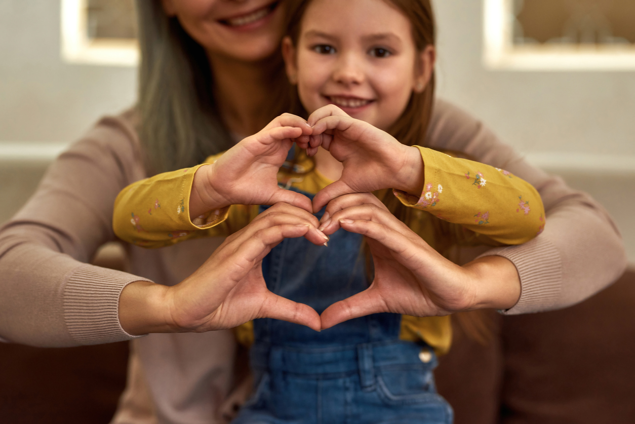 A happy mother and child after winning custody case, thanks to help from Borsberry Law's Child Custody Attorney for Peoria IL